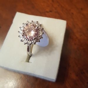 925 silver ring with pink topaz and white sappire.